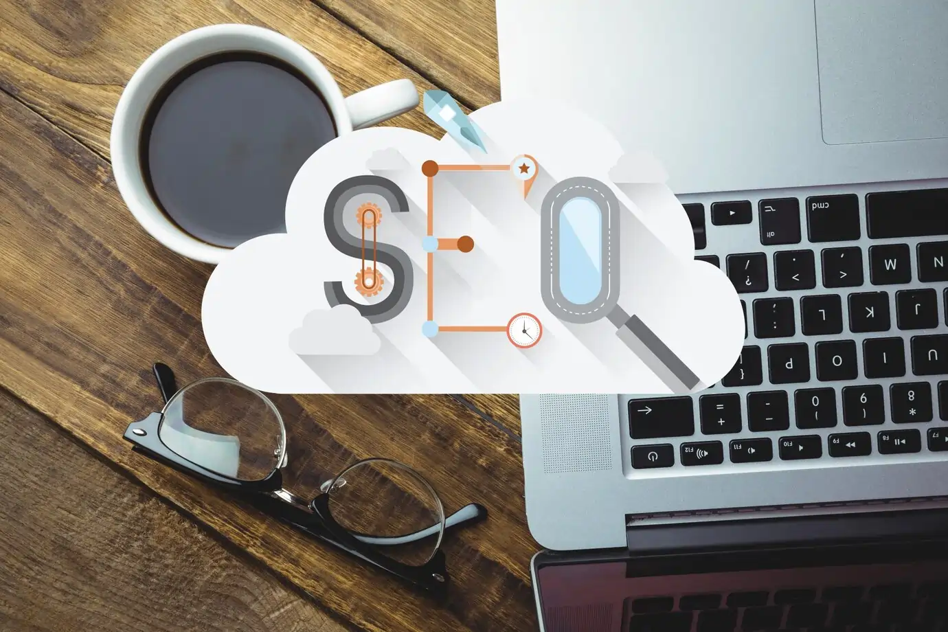 Coffee cup, glasses, and laptop with SEO graphic overlay representing digital marketing strategies for local businesses.